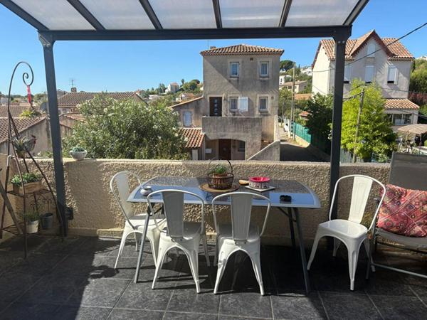 Appartement  3 pièce(s) 62 m2 avec terrasse et stationnement