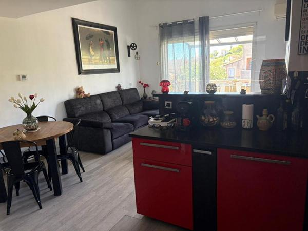 Appartement  3 pièce(s) 62 m2 avec terrasse et stationnement