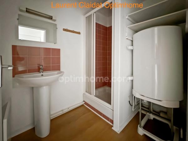 ENSEMBLE IMMOBILIER CENTRE-VILLE – 5 APPARTEMENTS ET UNE MAISON AVEC GARAGE