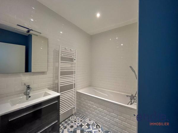 Appartement d'exception – 148 m² Carrez / 182 m² de surface totale – 4 chambres – proche centre-ville