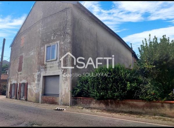 Maison à rénover au coeur du village de Labastide Rouairoux.