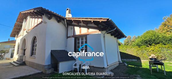 Maison individuelle de plain-pied 130 m² avec jardin clos et garage.