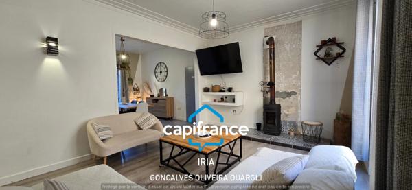 Maison individuelle de plain-pied 130 m² avec jardin clos et garage.