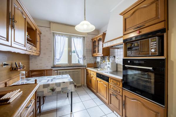 Maison jumelée de 107m2 avec 3 chambres et jardin,