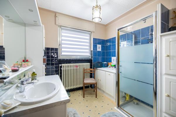 Maison jumelée de 107m2 avec 3 chambres et jardin,