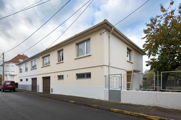 Maison jumelée de 107m2 avec 3 chambres et jardin,