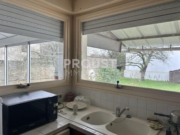 Maison ancienne quartier Nord jardin et garage.