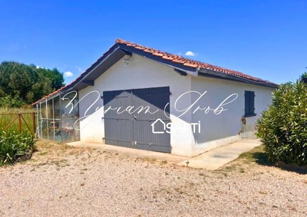 Charmante Maison dans cadre paisible sur grand terrain arboré de 2477m2