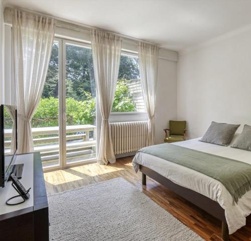 MAISON D’EXCEPTION – 242 m² – Terrain arboré de 929 m²