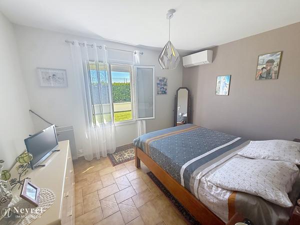 Maison de plain-pied 86 m² – Mornant, secteur La Condamine – 2 chambres, garage et extérieur aménagé