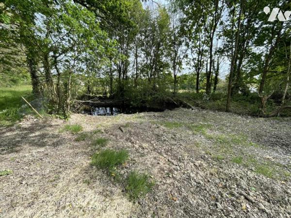 TERRAIN A BATIR ET PARCELLE AGRICOLE ATTENANTE CENTRE BOURG