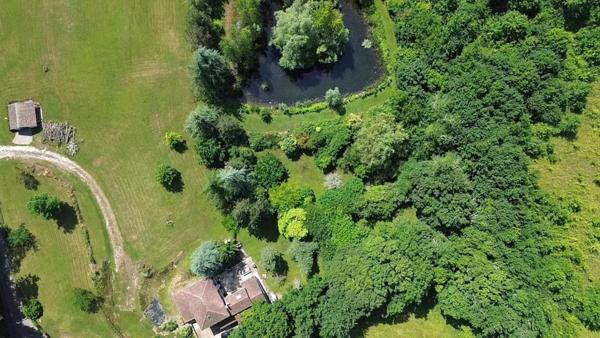 Havre de paix avec étang privé