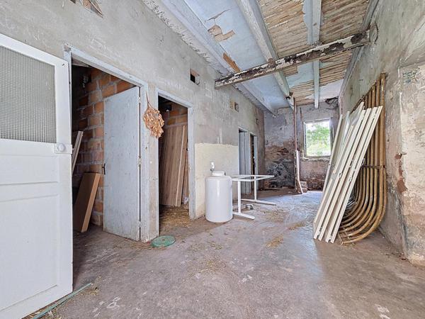 Grange à rénover avec terrain de 780 m² et puits