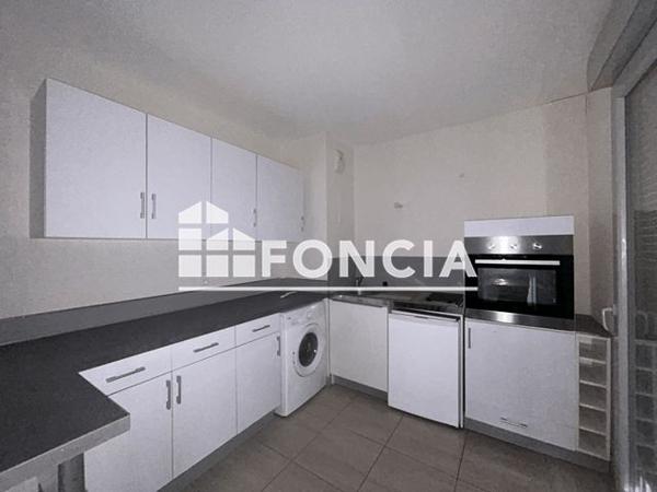 Location Appartement 2 pièces 38.65 m² - RESIDENCE COURS ET JARDINS Longvic 21600