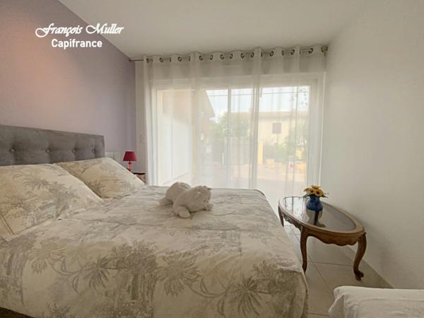 Appartement T4 96 m2 avec jardin au rez-de-chaussée d'une villa