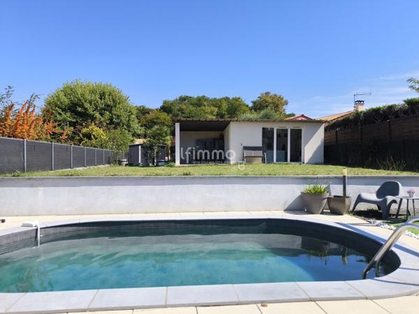 Maison contemporaine et économe avec studio indépendant.