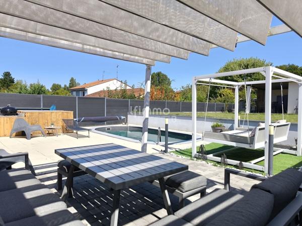 Maison contemporaine et économe avec studio indépendant.