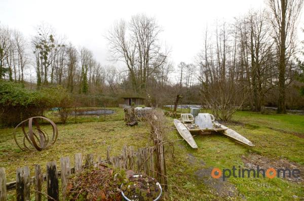 Propriété de 4 chambres au bord de la rivière à vendre