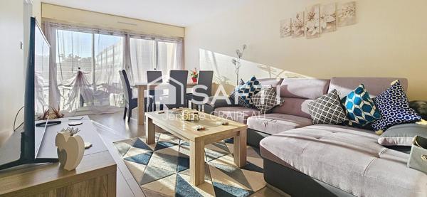 Centre ville : Appartement rénové avec 3 chambres + garage + cave + parking.