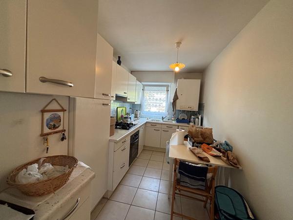 T.3 AURAY CENTRE VILLE avec ascenseur : 64 m2 avec garage et cave , Auray