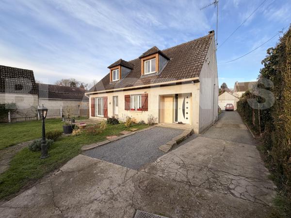  Maison familiale de 143 M2 rénovée avec un grand garage de 60M2 jardin et équipements modernes à Br