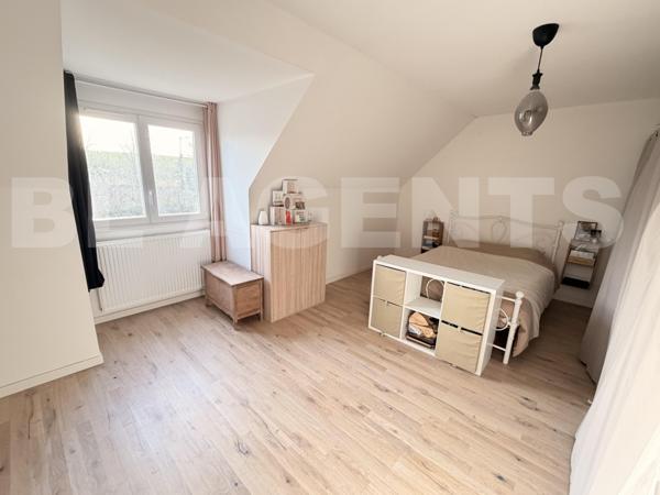  Maison familiale de 143 M2 rénovée avec un grand garage de 60M2 jardin et équipements modernes à Br