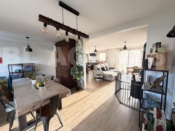  Maison familiale de 143 M2 rénovée avec un grand garage de 60M2 jardin et équipements modernes à Br