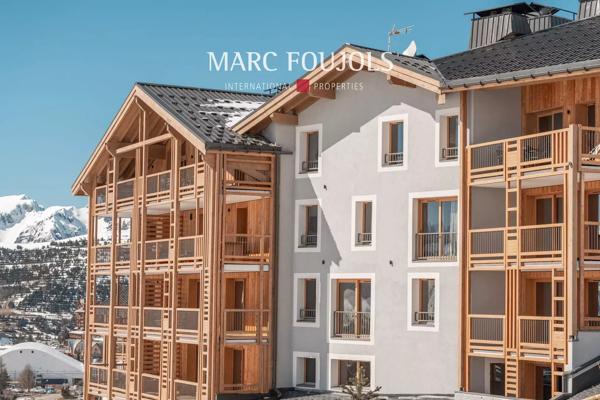 Penthouse 2 Chambres + mezzanine à l’Alpe d’Huez – Vue Panoramique et Services Haut de Gamme.
