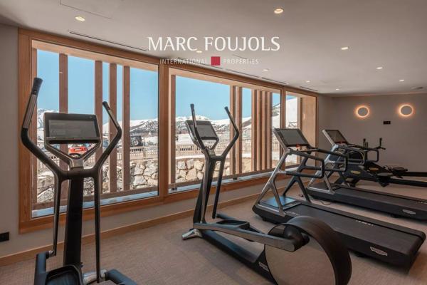 Penthouse 2 Chambres + mezzanine à l’Alpe d’Huez – Vue Panoramique et Services Haut de Gamme.
