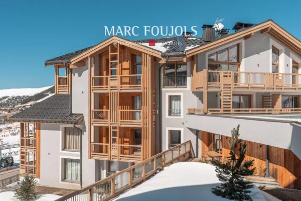 Penthouse 2 Chambres + mezzanine à l’Alpe d’Huez – Vue Panoramique et Services Haut de Gamme.