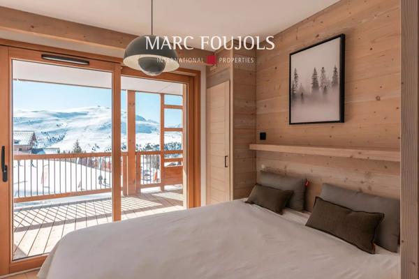Penthouse 2 Chambres + mezzanine à l’Alpe d’Huez – Vue Panoramique et Services Haut de Gamme.