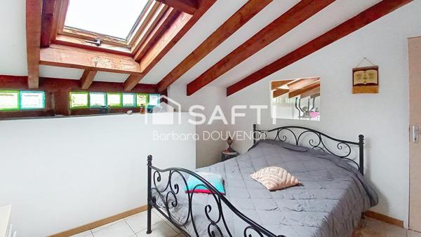Maison de village de 125 m² - 3 terrasses - grand garage.