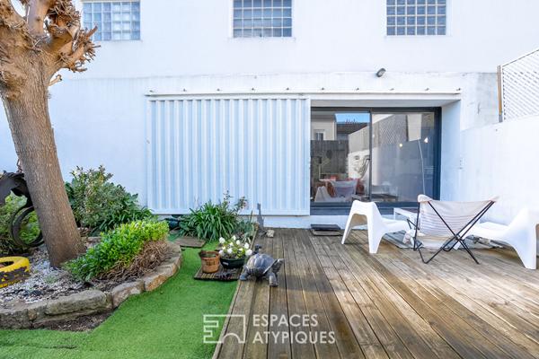 Maison-loft cachée avec jardin au coeur d’un ancien atelier