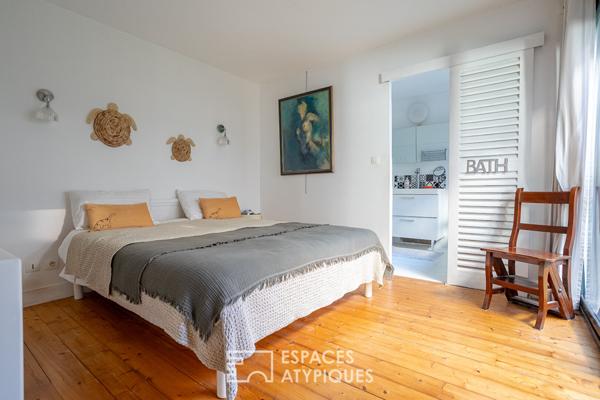 Maison-loft cachée avec jardin au coeur d’un ancien atelier