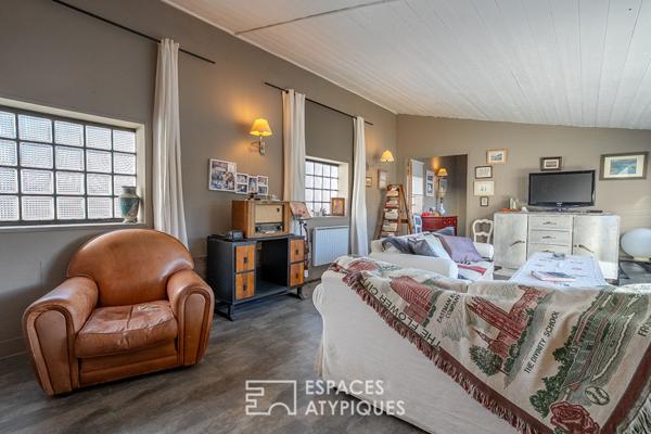 Maison-loft cachée avec jardin au coeur d’un ancien atelier