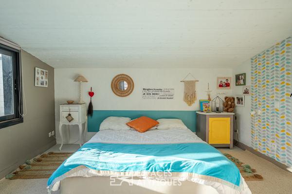 Maison-loft cachée avec jardin au coeur d’un ancien atelier