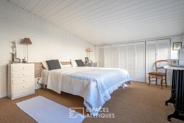 Maison-loft cachée avec jardin au coeur d’un ancien atelier