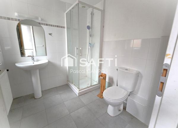 immeuble de 5 appartements et un local commercial