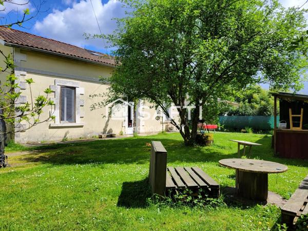 Maison spacieuse en plein centre du village