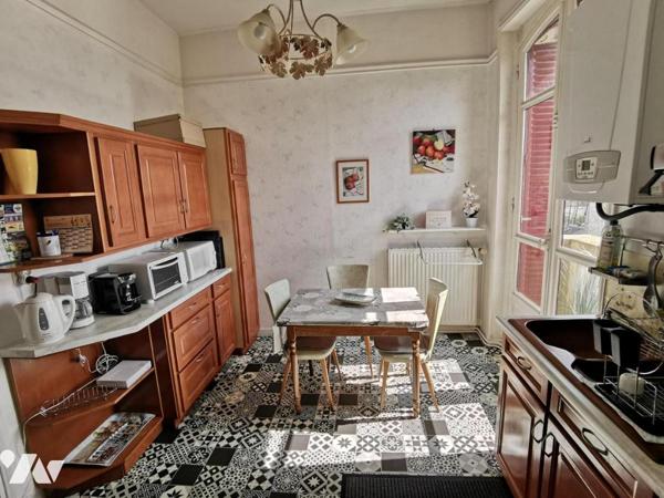 DEUX PIECES 53 m² - Cave et parking - centre-ville