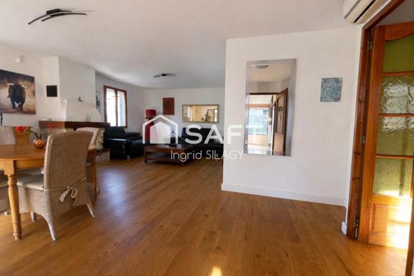 Maison lumineuse avec véranda, piscine et garage