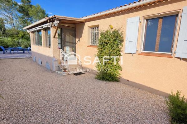 Maison lumineuse avec véranda, piscine et garage