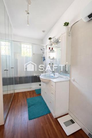 Maison lumineuse avec véranda, piscine et garage