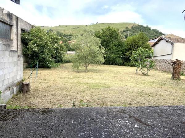 Maison + appartement + jardin + garage