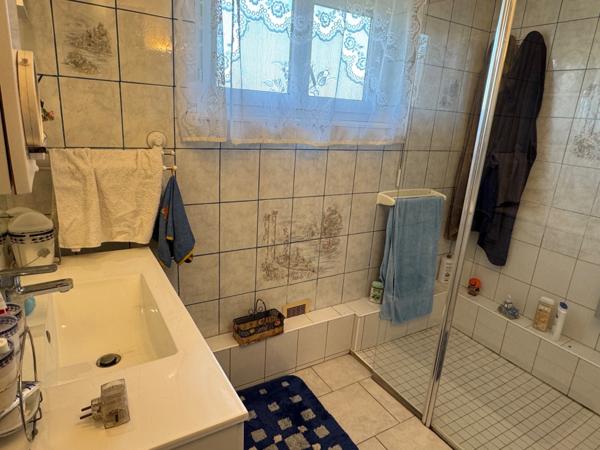 PAVILLON DE PLAIN PIED AVEC JARDIN ET GARAGE