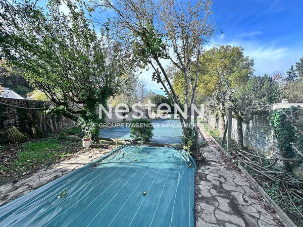 Vente maison de charme en pierre de 128.97 m² avec 3 chambres, terrain clos en bord de Loir, centre ville de La Chartre-sur-Le-Loir (72340)