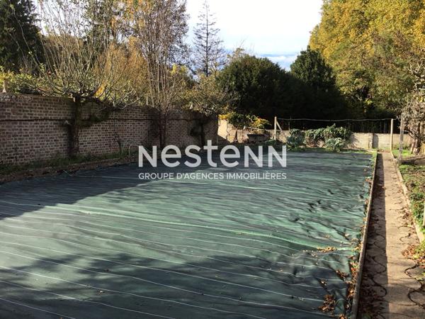 Vente maison de charme en pierre de 128.97 m² avec 3 chambres, terrain clos en bord de Loir, centre ville de La Chartre-sur-Le-Loir (72340)