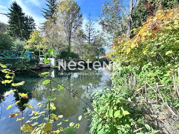 Vente maison de charme en pierre de 128.97 m² avec 3 chambres, terrain clos en bord de Loir, centre ville de La Chartre-sur-Le-Loir (72340)