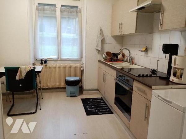 maison de rapport comprenant 3 appartements , un jardin et un garage