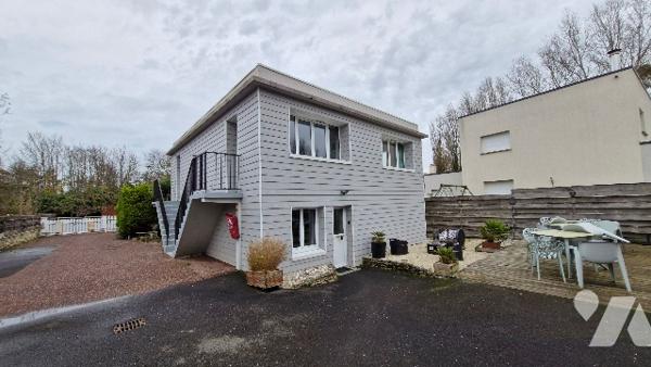 Immeuble d'habitation comprenant :